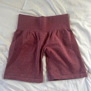 NVGTN Women's Burgundy Mid Rise Contour Seamless Shorts